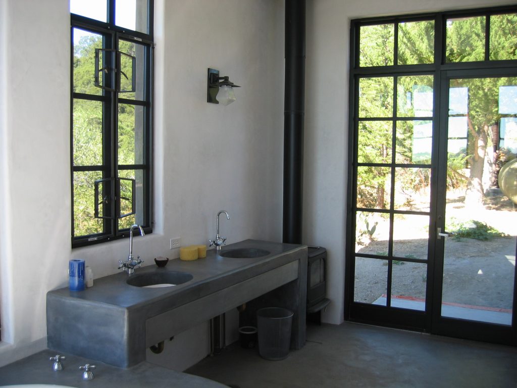 Site Poured Concrete Vanities + Wood Stove