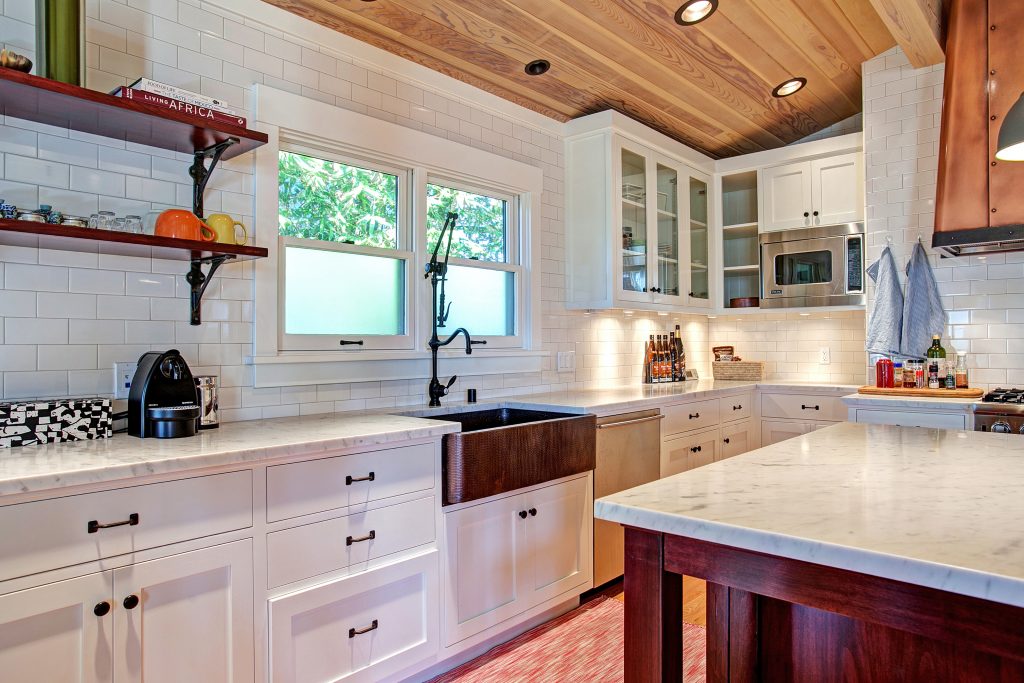Traditional Craftsman kitchen with custom shelving brackets