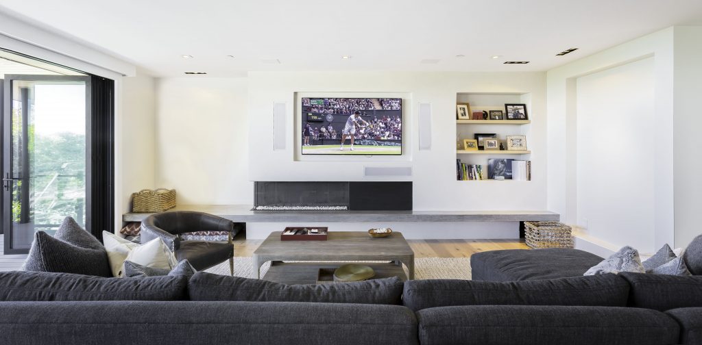 Modern Corner Fireplace + Concrete Cantilevered Hearth